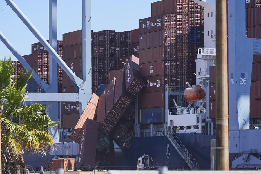Container Spill at Long Beach (AP Photo/ Damian Dovarganes)